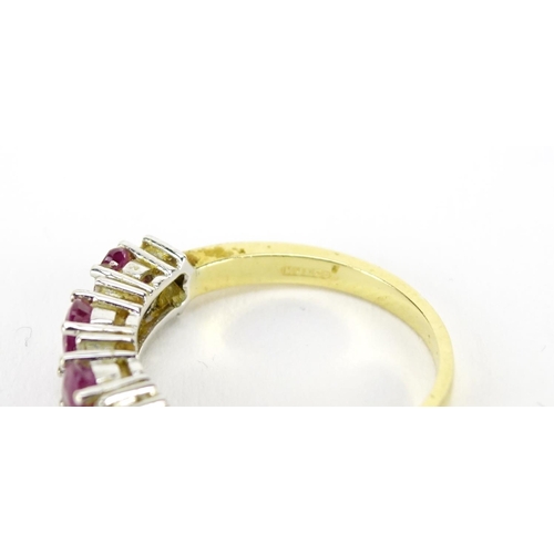 2797 - 18ct gold ruby and diamond half eternity ring, size N, 4.0g