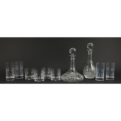 2434 - Two Waterford crystal Marquis decanters and two sets of four crystal glasses, the largest 31cm high