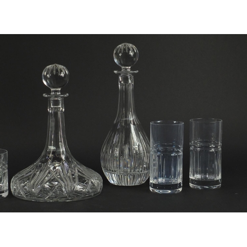 2434 - Two Waterford crystal Marquis decanters and two sets of four crystal glasses, the largest 31cm high
