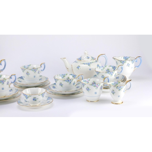 2433 - Crown Staffordshire teaware including teapot, trio's and a sandwich plate, the teapot 14.5cm high