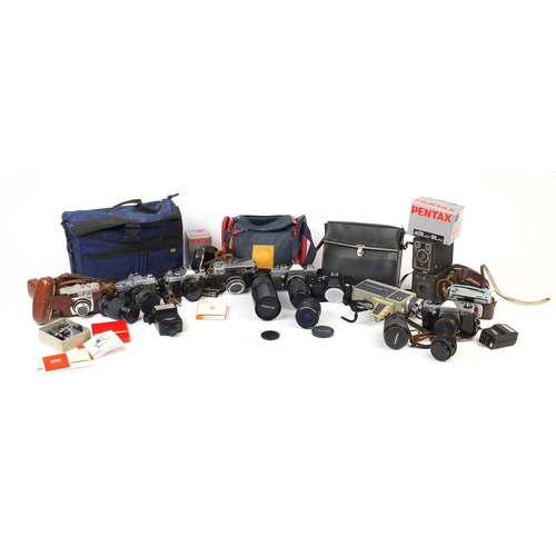 632 - Vintage and later cameras, lenses and accessories including Praktica, Pentax, Tokina and Canon