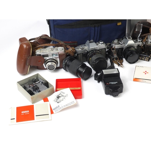 632 - Vintage and later cameras, lenses and accessories including Praktica, Pentax, Tokina and Canon