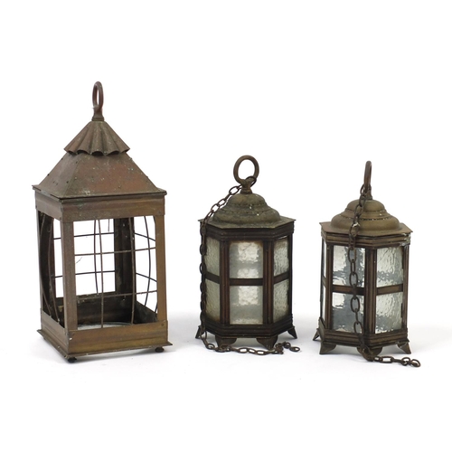 679 - Three vintage copper and brass lanterns, the largest 43cm high