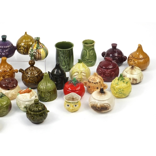 608 - Large collection of novelty face pot jars including Raymond pottery, Hornsea and Sylvac