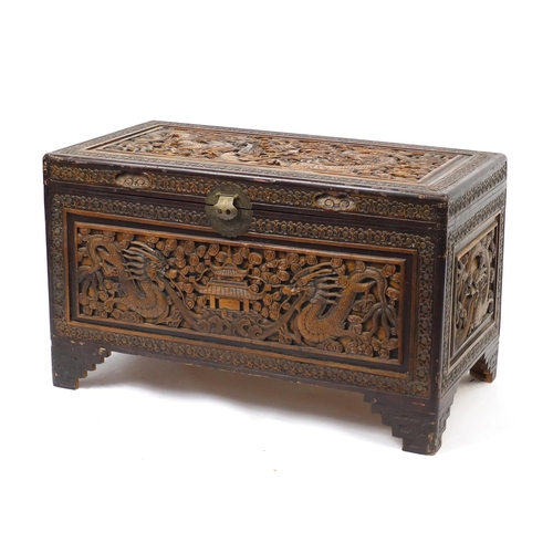 5 - Chinese camphorwood chest carved with dragons, fish and a temple, 60cm H x 100cm W x 53cm D
