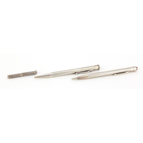2568 - Two sterling silver propelling pencils and a silver tooth pick