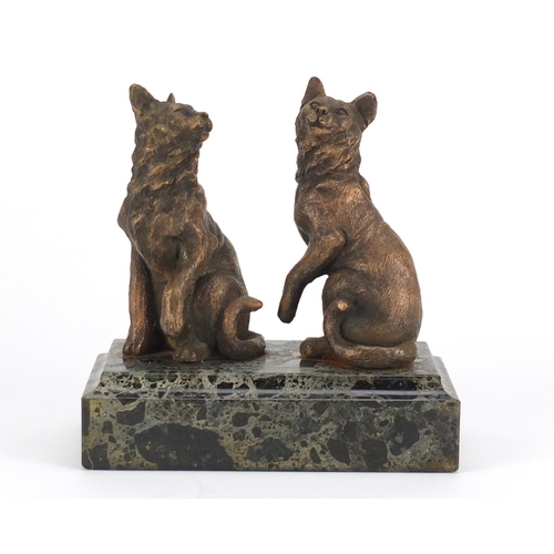 2427 - Bronzed study of two kittens raised on a rectangular  marble base, 17.5cm high