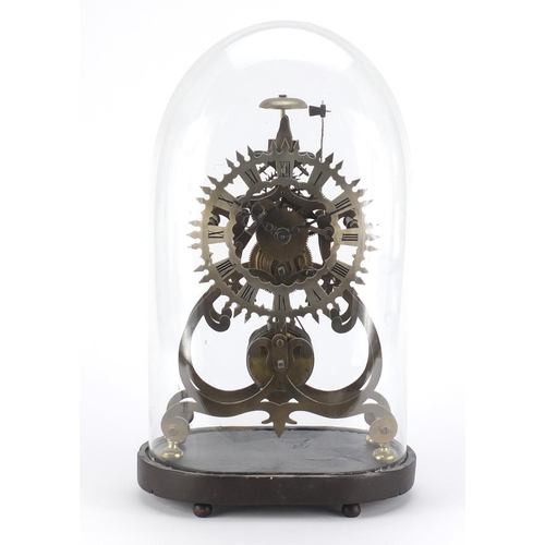 2174 - Gothic style brass  skeleton clock with fusee movement, under glass dome on an ebonised stand, overa... 