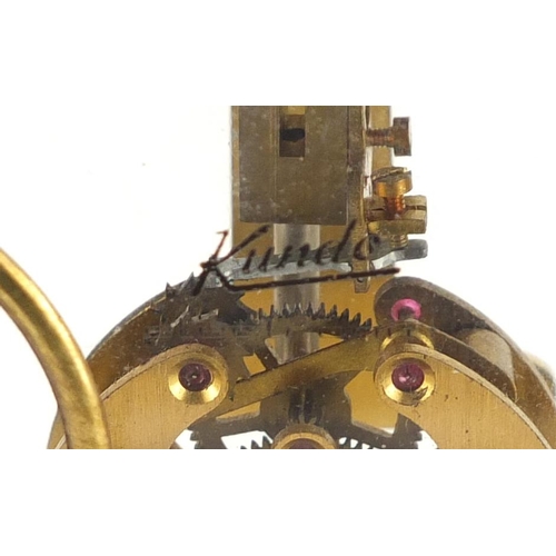 2224 - Kundo electric Skelton mantel clock, 26cm high