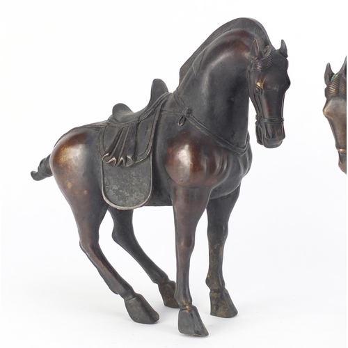 2149 - Pair of Chinese patinated bronze Tang style horses, each 29.5cm high