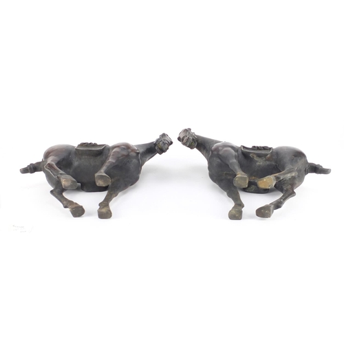 2149 - Pair of Chinese patinated bronze Tang style horses, each 29.5cm high