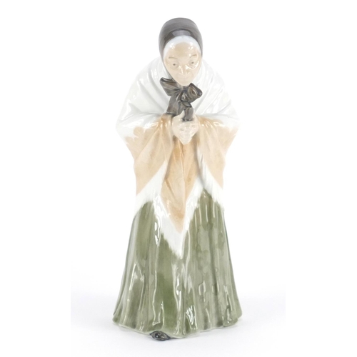 2360 - Royal Copenhagen figurine of The Church Goer,  numbered 892, 25cm high
