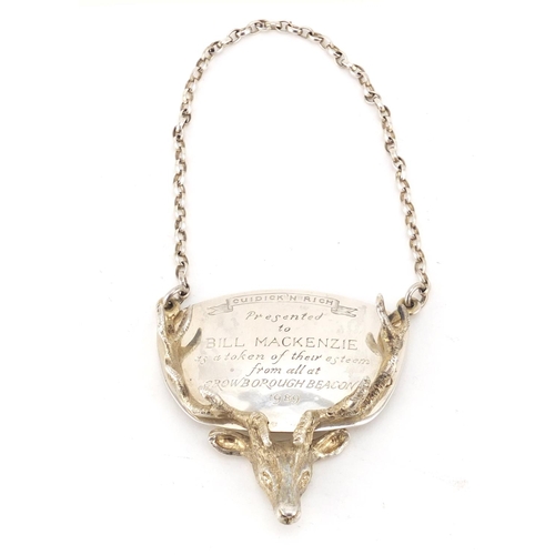 2657 - Large silver stags head decanter label with presentation inscription, London 1989, 6cm in length, 42... 