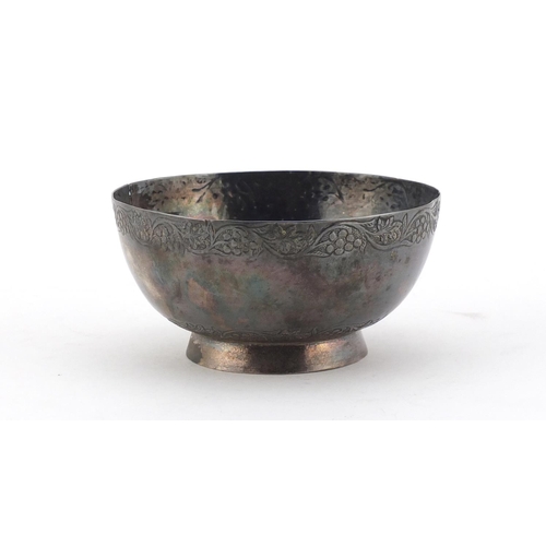 2656 - Circular unmarked silver footed bowl, engraved with fruiting vines, 10.5cm in diameter, 121.7g