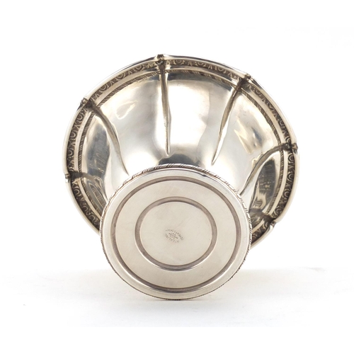 2653 - American sterling silver footed bowl, embossed with stylised motifs, 8cm high, 113.5g