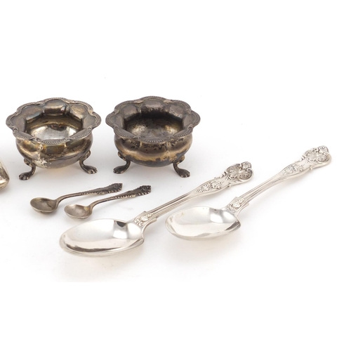 2633 - Silver items including a pair of Victorian tablespoons, pair of open salts with spoons and a rectang... 