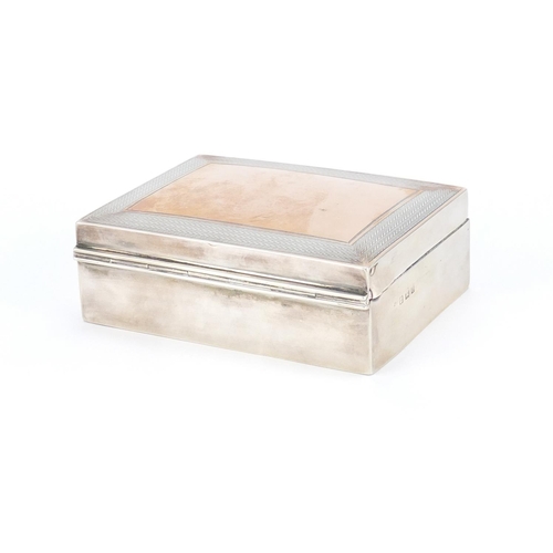 2634 - Rectangular silver cigarette box, the hinged lid with engine turned decoration, Birmingham 1924, 11.... 