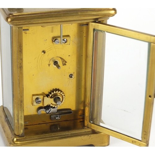 2236 - Brass cased carriage clock with enamelled dial and Roman numerals, retailed by Dickinson Silver Smit... 