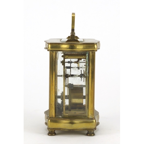 2250 - French brass cased serpentine fronted carriage clock with enamelled dial and Roman numerals, 12cm hi... 