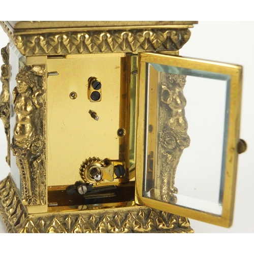 2190 - Miniature brass cased carriage clock by Charles Frodsham, with nude female supports, the enamelled d... 