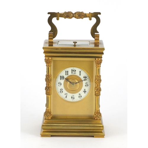 2183 - Large French gilt brass cased repeating carriage clock striking on a gong, the enamelled chapter rin... 