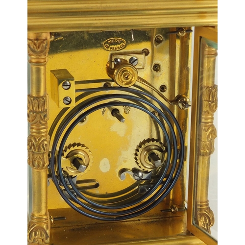 2183 - Large French gilt brass cased repeating carriage clock striking on a gong, the enamelled chapter rin... 