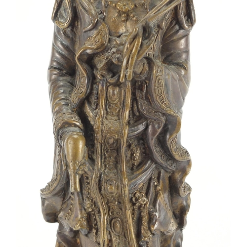 2231 - Chinese bronze figure of Guanyin standing on a toad and lotus leaf, 33cm high