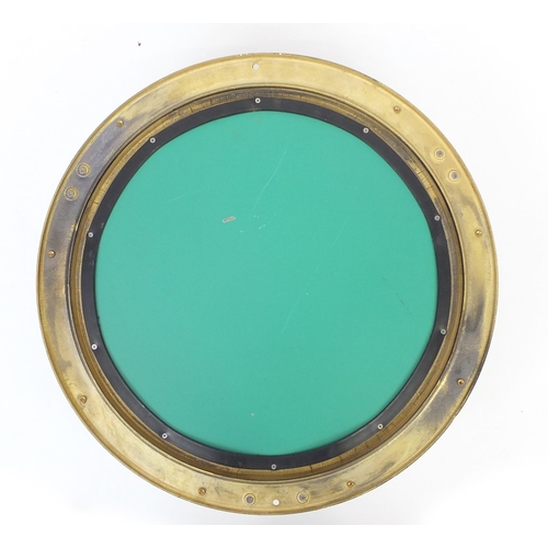 2031 - Brass ships porthole design mirror, 47cm in diameter