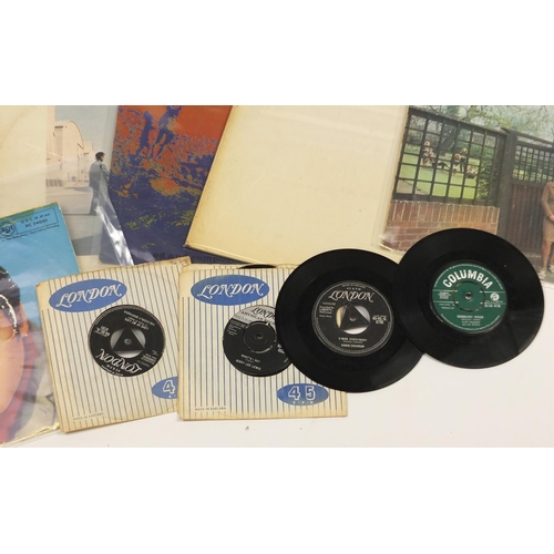 2542 - Vinyl LP's and singles including Beatles White Album numbered 0125070, Fairport Convention, Elvis Pr... 