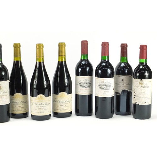 2317 - Eleven bottles of red wine including four 2000 Château De Calce Cotes Du Roussillon, two bottles of ... 