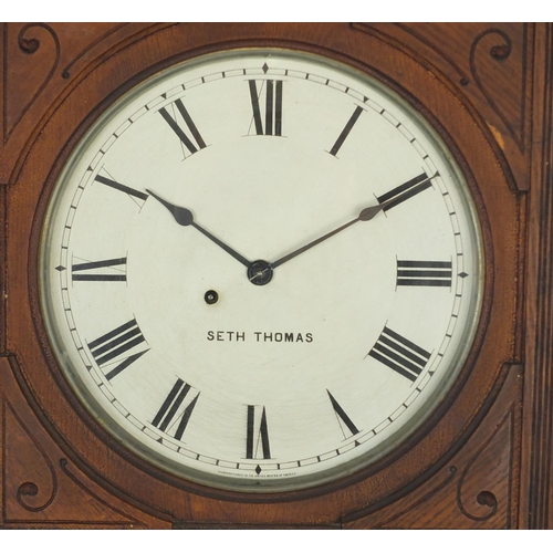 2095 - Railway interest oak cased American wall clock by Seth Thomas, the painted dial with Roman numerals,... 