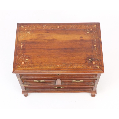 2096 - Indian hardwood chest, the hinged lid with brass inlay above three drawers, 33cm H x 39cm W x 26cm D