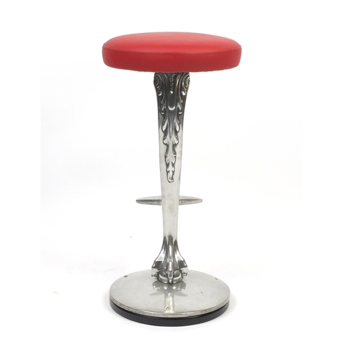 2104 - Contemporary chrome bar stool with cushioned red leather seat and ball and claw support, 77cm high