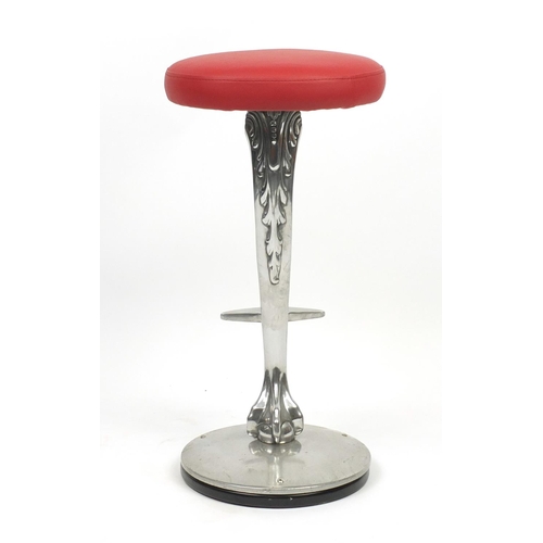 2102 - Contemporary polished aluminium bar stool with red leather seat and ball and claw support, 77cm high