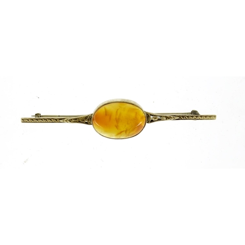 2815 - 14ct gold cabochon carnelian bar brooch, 7cm in length, 6.8g