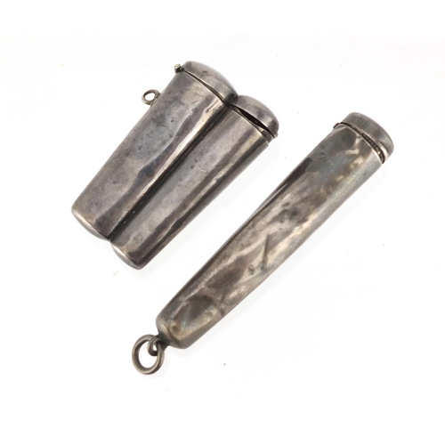 2636 - Two silver cheroot cases, housing two amber coloured cheroots with 9ct gold mounts, the largest 8cm ... 