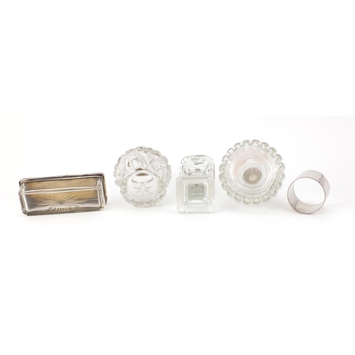 2665 - Four Victorian and later cut glass jars with silver mounts and a circular silver napkin ring, with t... 