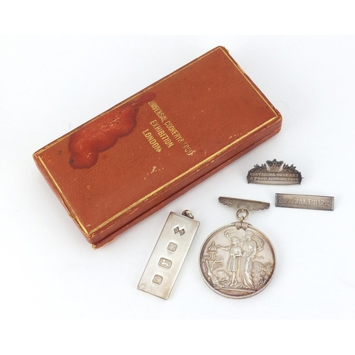 2643 - Universal Cookery and Food Exhibition silver special prize medal, with fitted case, engraved Present... 