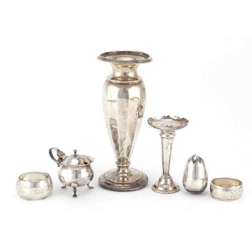 2644 - Silver items including vases, napkin rings and a mustard, various hallmarks, the largest 18.5cm high... 