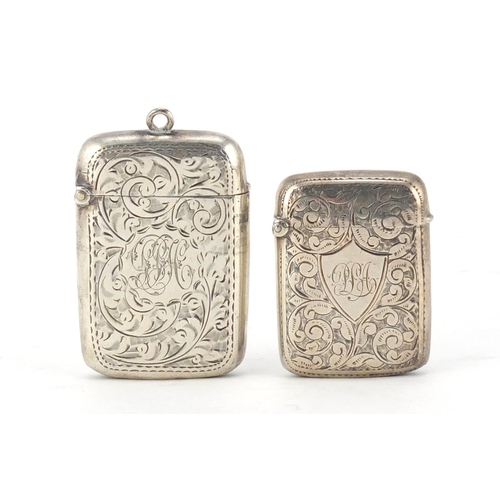 2655 - Two Victorian and Edwardian silver vesta's with engraved decoration, Birmingham hallmarks, the large... 