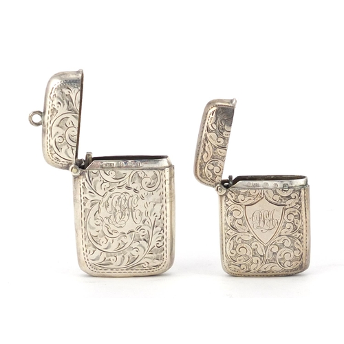 2655 - Two Victorian and Edwardian silver vesta's with engraved decoration, Birmingham hallmarks, the large... 