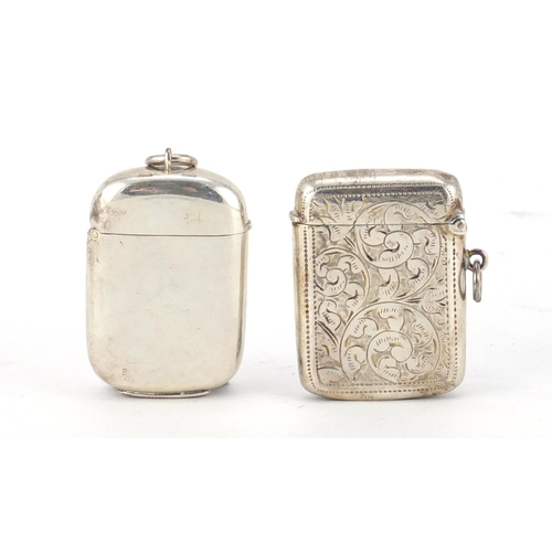2649 - Two Victorian silver vesta's, one with engraved decoration, Birmingham hallmarks, each 4.6cm in leng... 