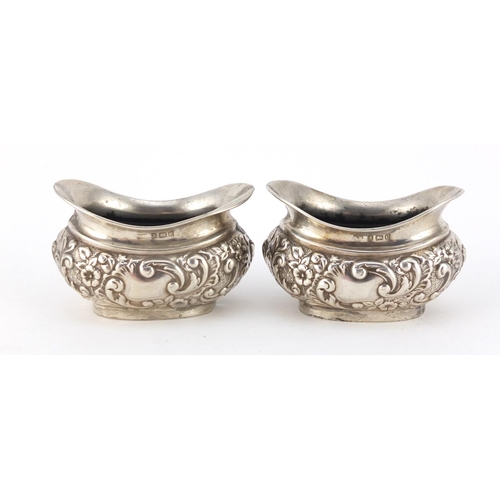 2647 - Pair of Victorian silver open salts with embossed decoration, SB Birmingham 1902, 6.5cm in length, 6... 
