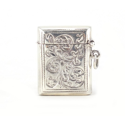 2635 - Sterling silver vesta with enamelled risqué female plaque, 3.8cm high, 18.0g