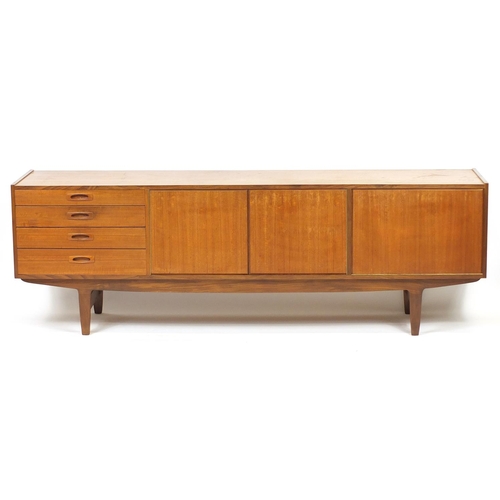 2012 - Vintage teak sideboard fitted with a fall, pair of cupboard doors and three drawers, possibly Scandi... 