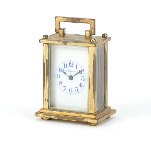 2489 - Miniature brass cased carriage clock with enamelled dial inscribed Mignon, 6.5cm high