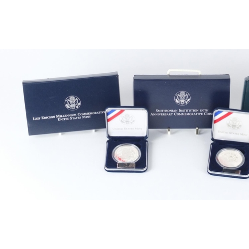 2714 - Four United States Mint silver proof dollars with cases and boxes comprising Yellowstone National Pa... 