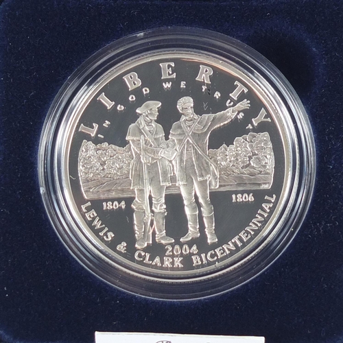 2717 - Three United States Mint silver proof dollars with cases and boxes comprising Lewis & Clark, 1997 Bo... 