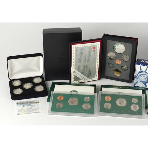 2721A - Eleven United States mint proof sets together with a Royal Canadian mint proof set and US hologram f... 