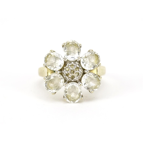 2808 - 9ct gold white sapphire flower head ring, size N, 5.3g